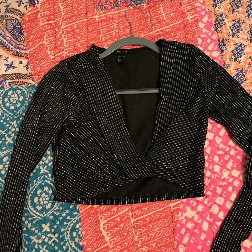 Black and silver going out top